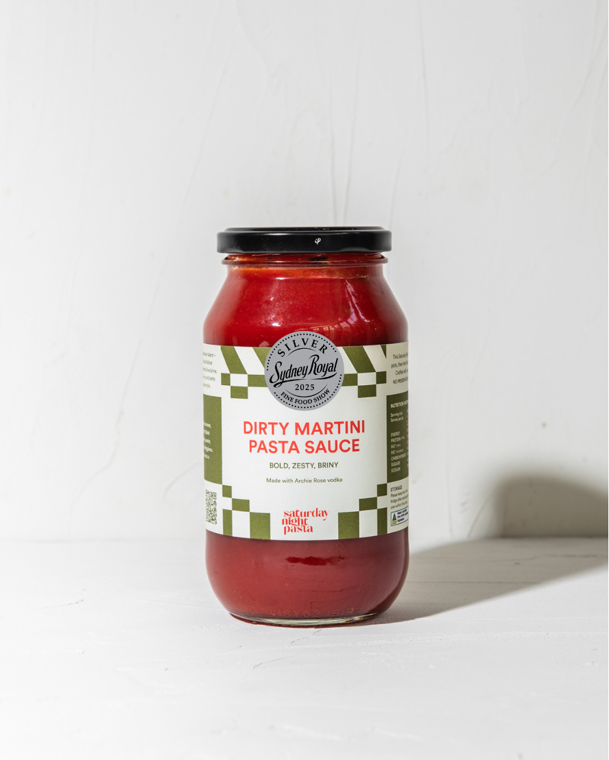 Jar of Dirty Martini Pasta Sauce on a white background