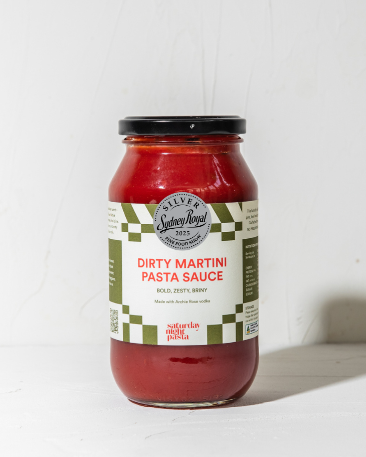 Jar of Dirty Martini Pasta Sauce on a white background