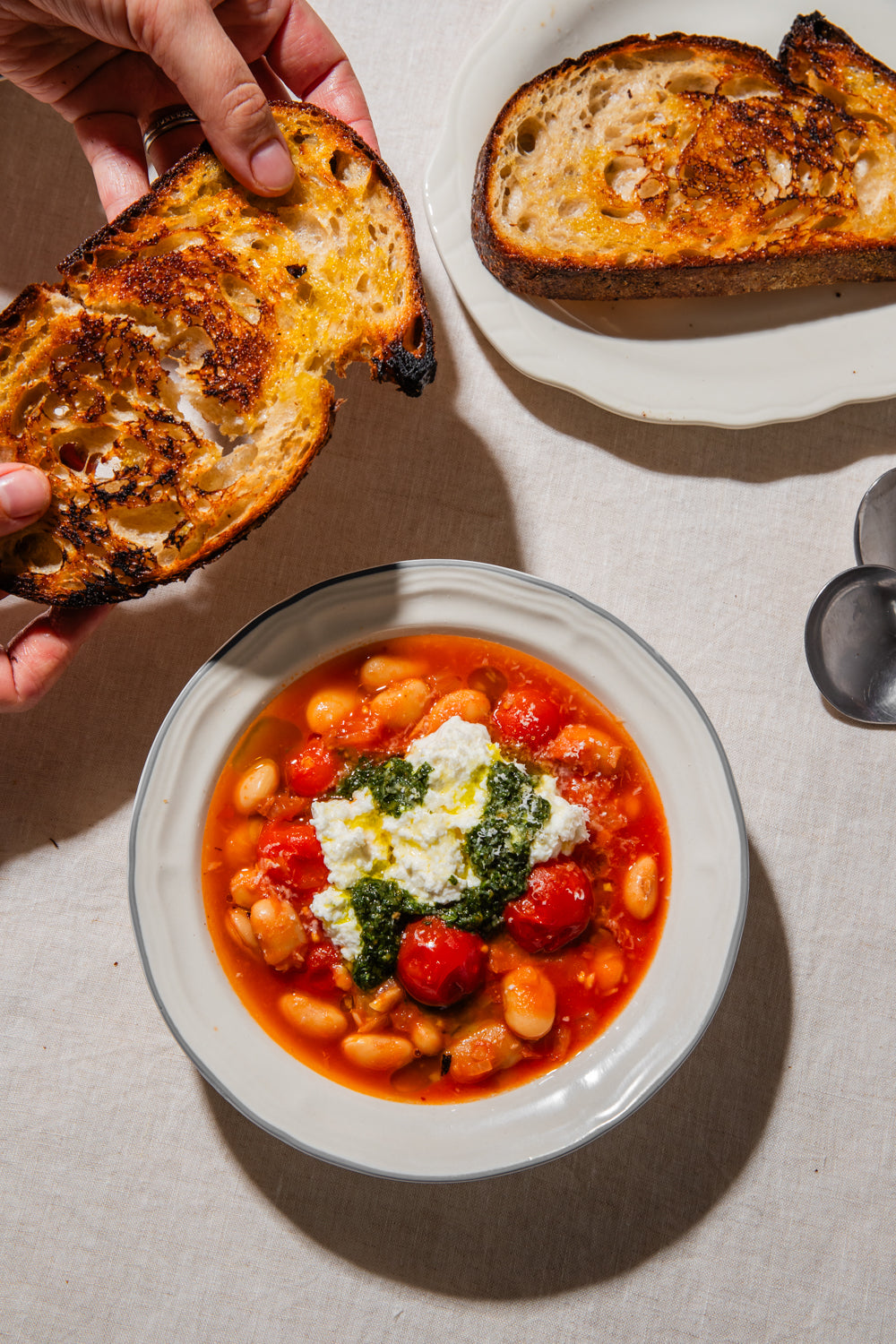 Dirty Martini Beans with a Basil and Olive Pesto